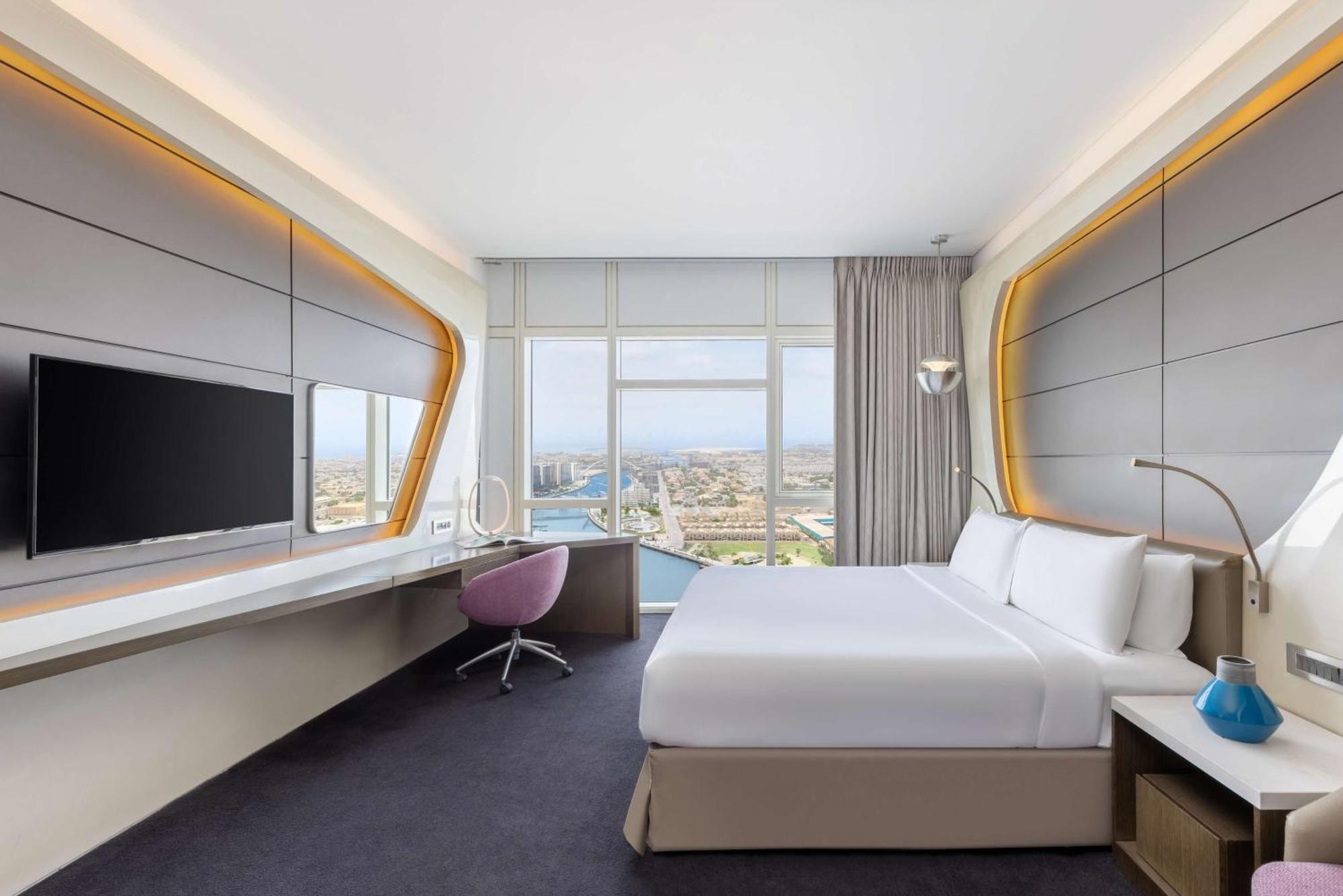 V Hotel Dubai, Curio Collection By Hilton Екстер'єр фото A room at the hotel