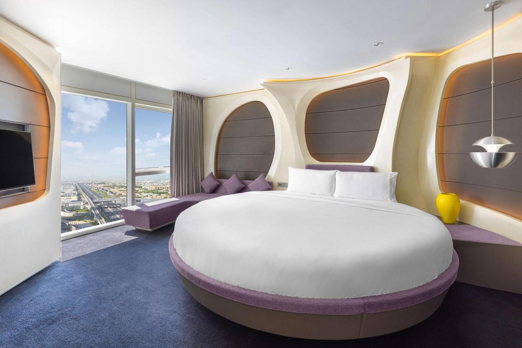 V Hotel Dubai, Curio Collection By Hilton Екстер'єр фото A bedroom at the hotel